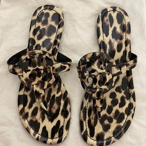 Tory Burch Miller Natural Leopard patent sandals.